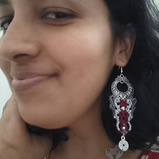 macrame dangler earrings with a chandbali and silver accents