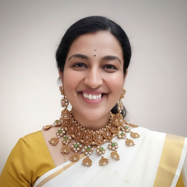 Kusum handmade macramé necklace and jhumki earring set with pink, green and white glass rhinestones