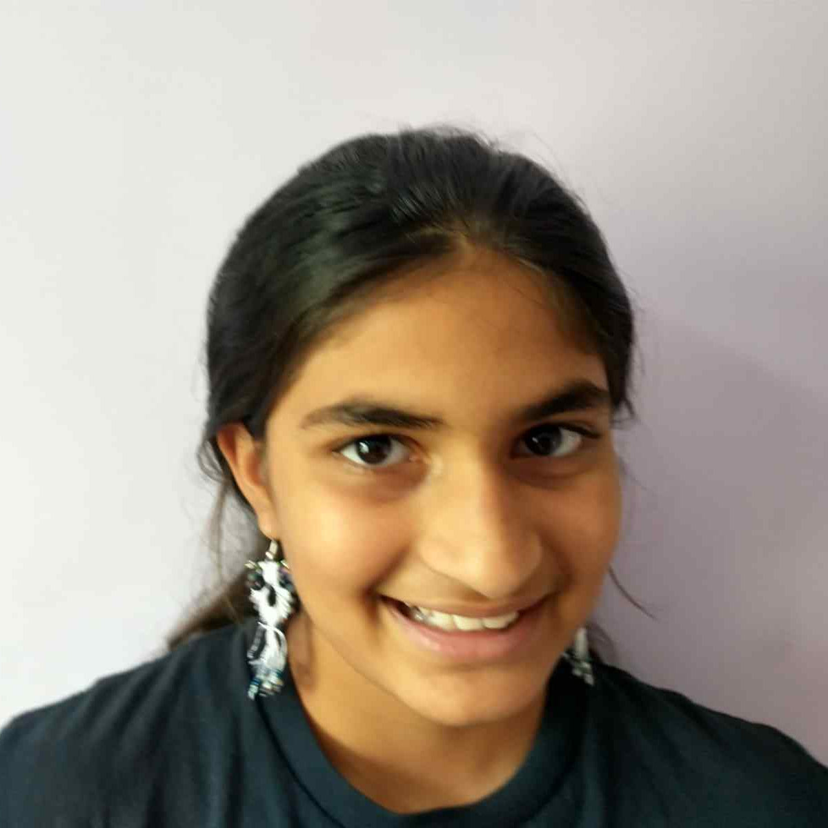 micro-macrame owl dangler earrings with bead embellished tail feathers