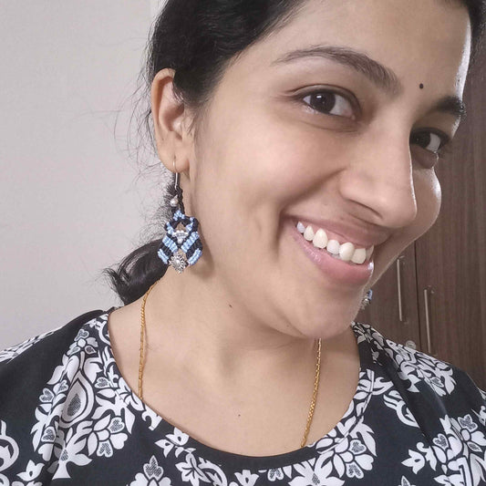 macrame dangler earrings with floral charm and gunghroo beads